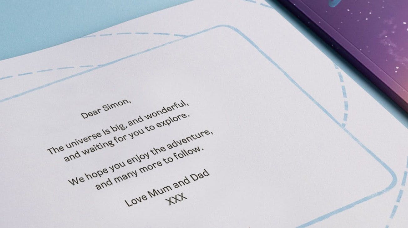 Zoomed-in image of the personalized dedication from Mum and Dad to their son, Simon